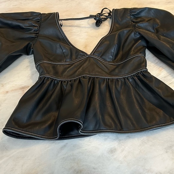 STAUD

Luna V-Neck Peplum Faux-Leather Top - Picture 3 of 8